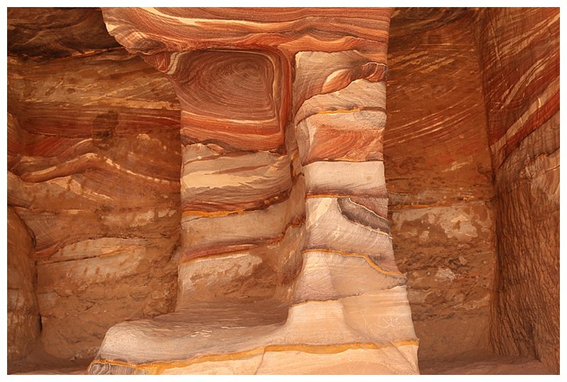 The sandstone and lime rock beautifully coloured by the weathering, almst a mosiac