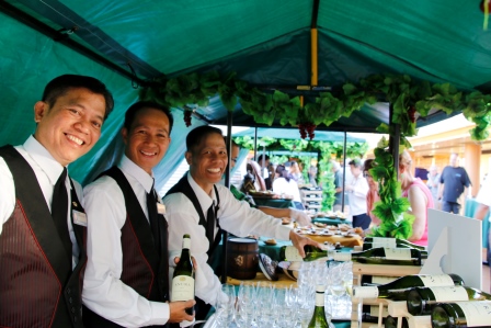 A wine stall and beverage staff