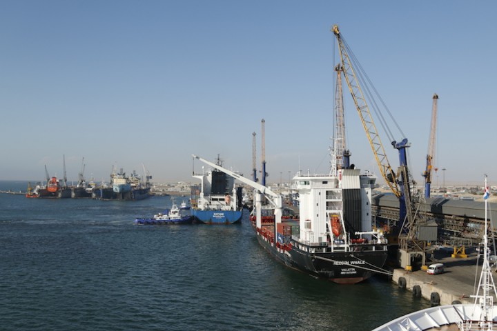 The port, with a container ship berthing