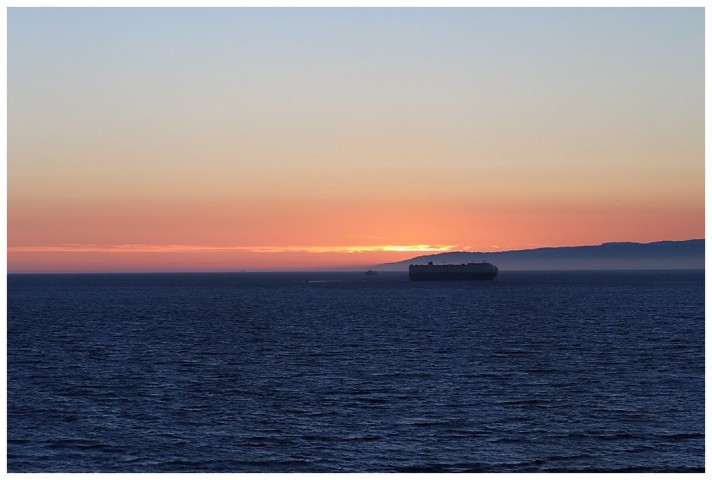 Sunset in the Juan de Fuca Straits; a car-carrier eastbound for Seattle/Tacoma