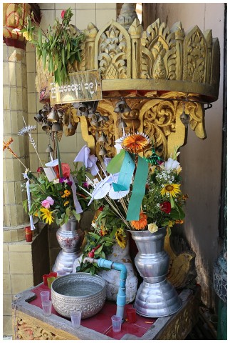 Flowers and articles placed by worshippers