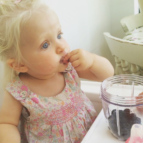Violet snacking on her favourite blackberries