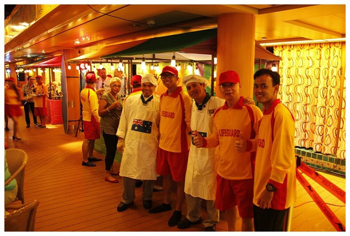The party theme was "Australian Beach party', some of our crew, in Lifeguard uniform