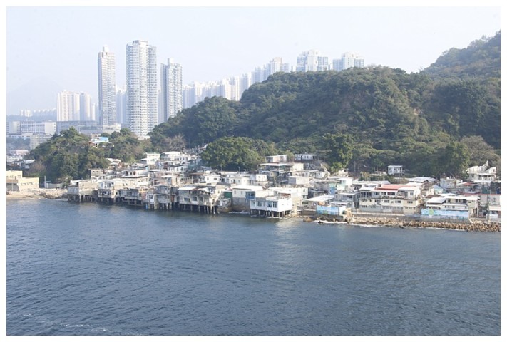 The old and the new, the fishing village of Lie Yue Mun and the skyscrapers of Kowloon.