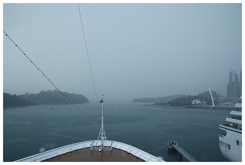 Having swung in Cruise Bay, we back in during heavy rain