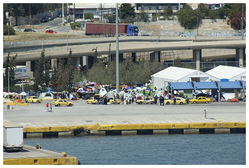 Tucked over by the ferry terminal, refugee tents